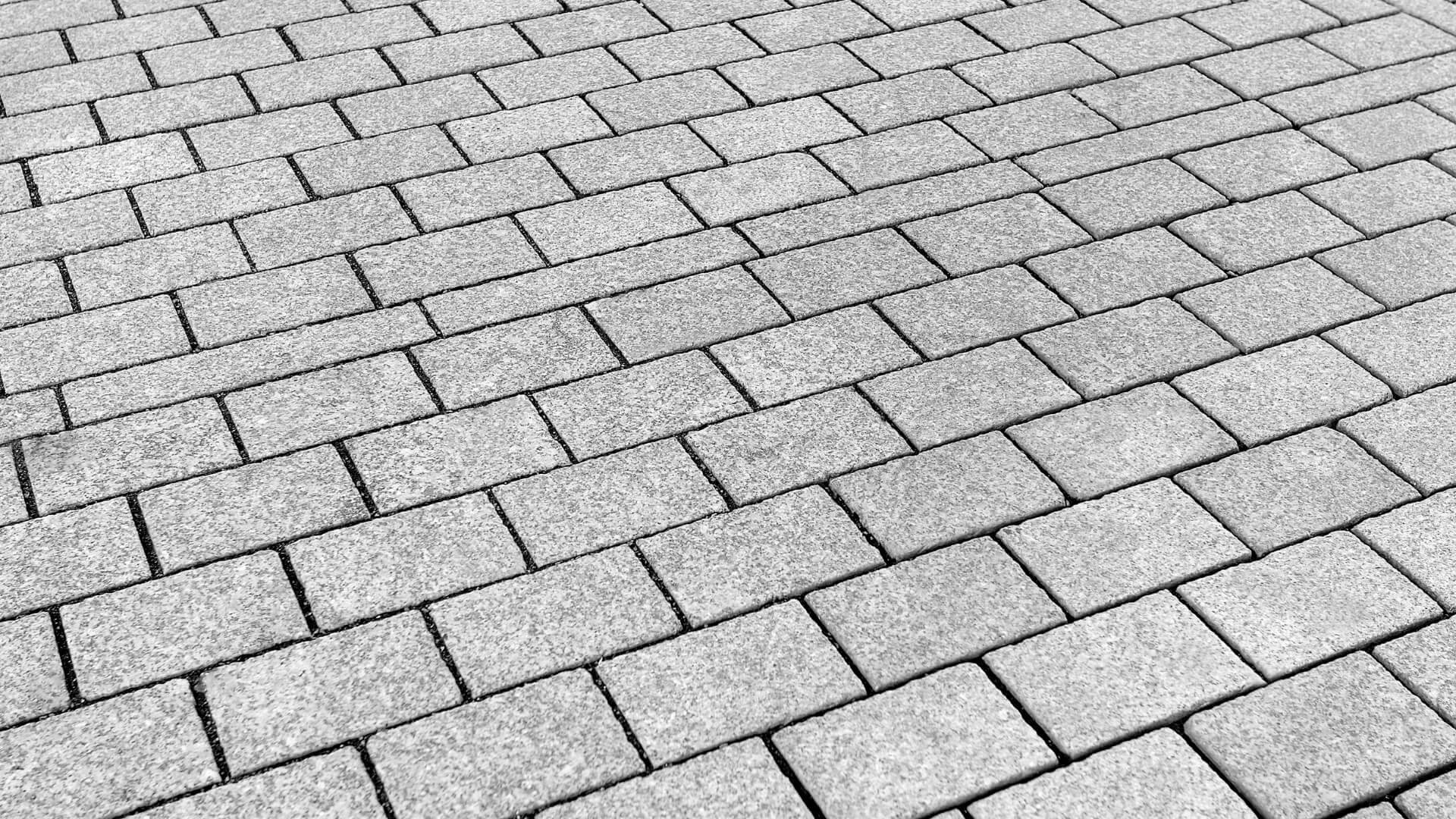 Jak skutecznie myć kostkę brukową? Poradnik krok po kroku!